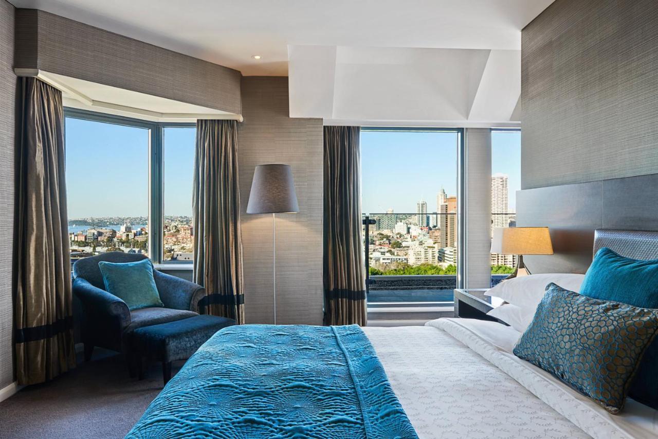 Sheraton Grand Sydney Hyde Park Exterior foto A bedroom at the hotel